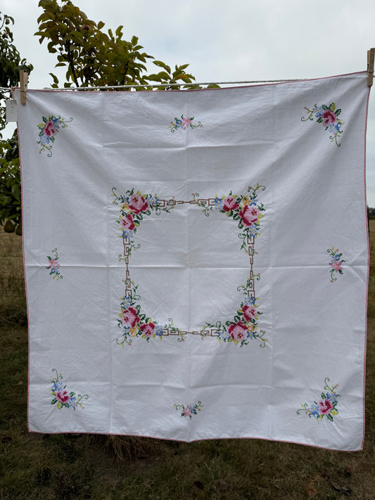 AA.Multi color cross stitch with pink edging 32" x 32"