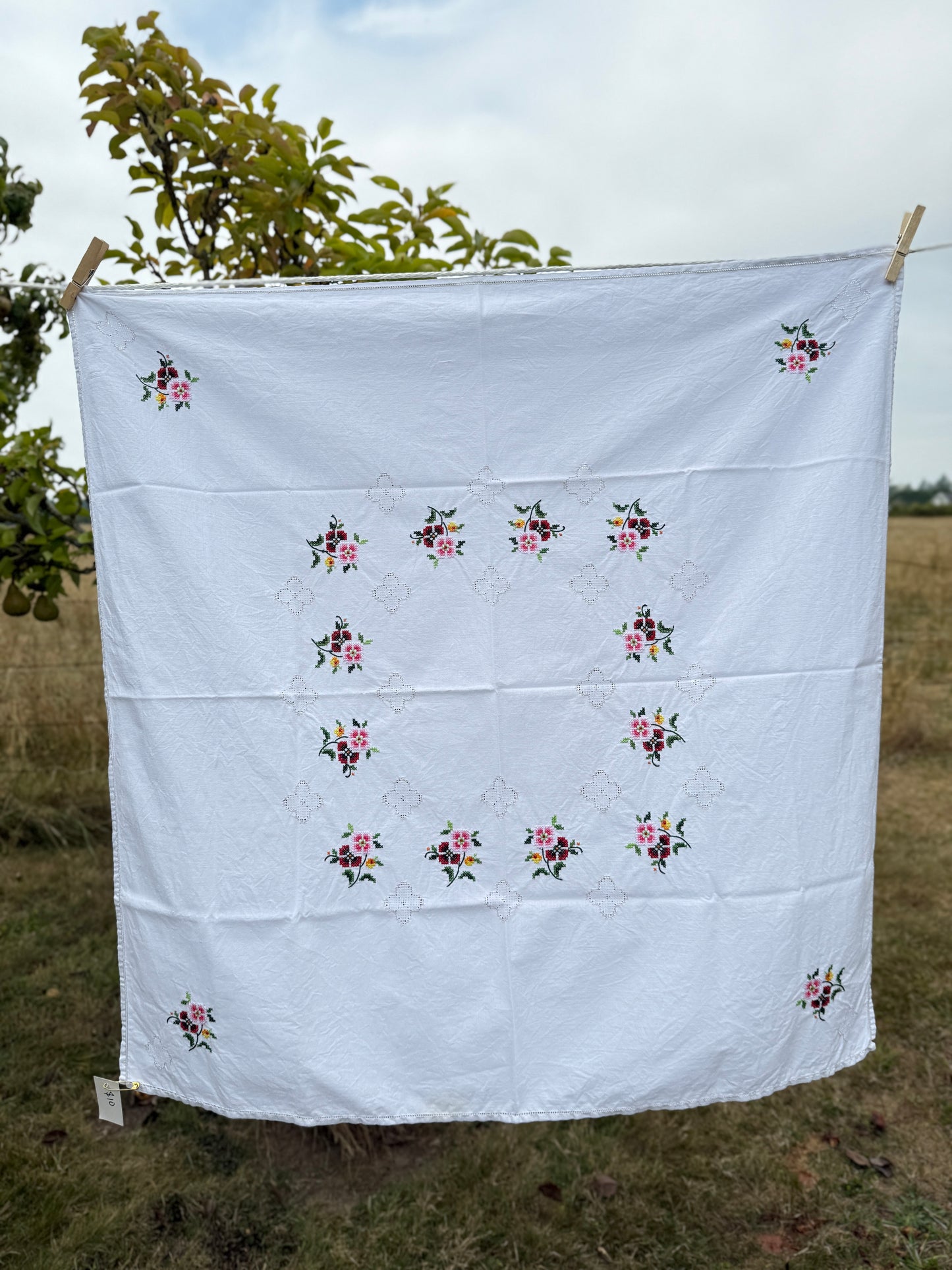 AA.Multi color cross stitch with tan entredeux edging 32" x 32"