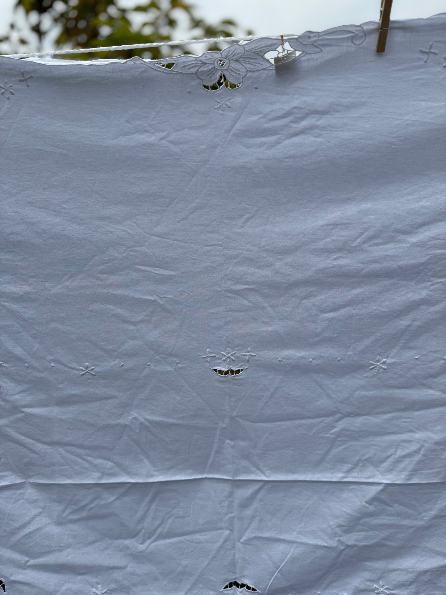 AA.White on white cut work 50" x 70"