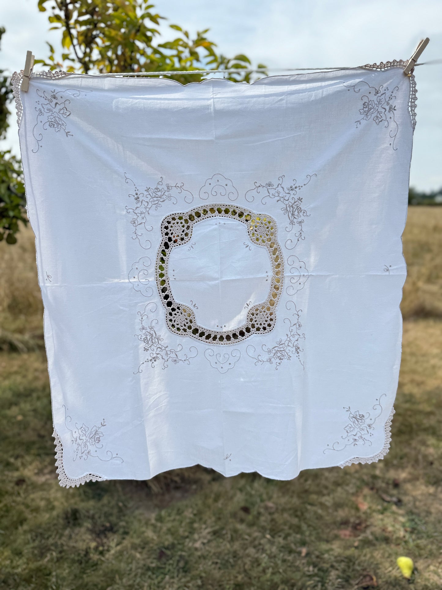 AA.off white with tan crochet inserts and trim 31" x 32"