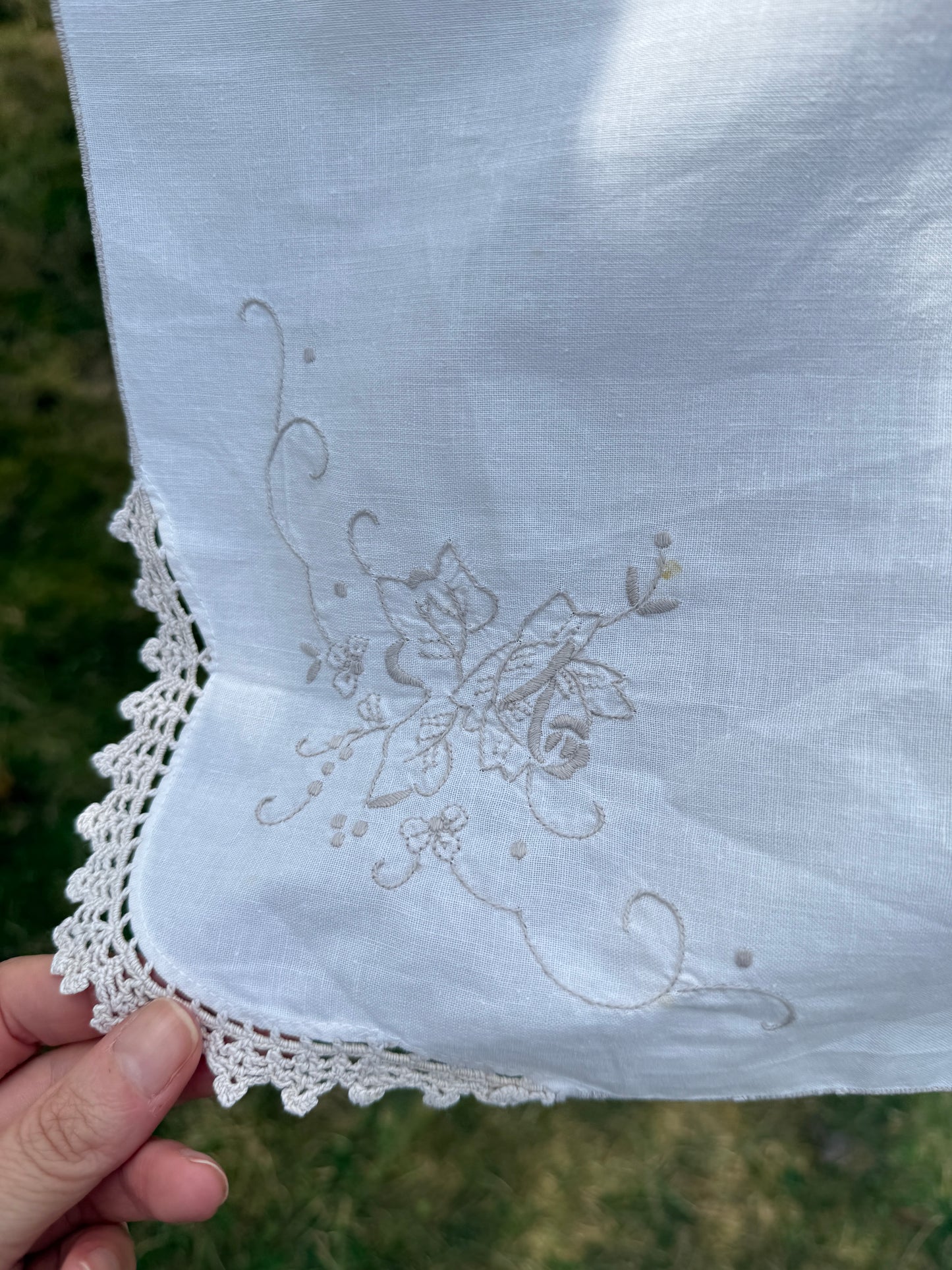 AA.off white with tan crochet inserts and trim 31" x 32"