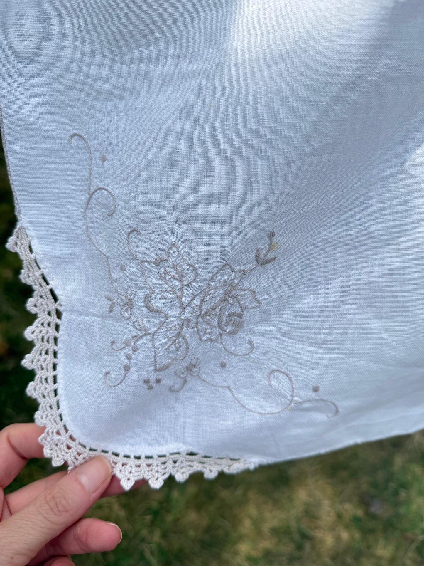 AA.off white with tan crochet inserts and trim 31" x 32"