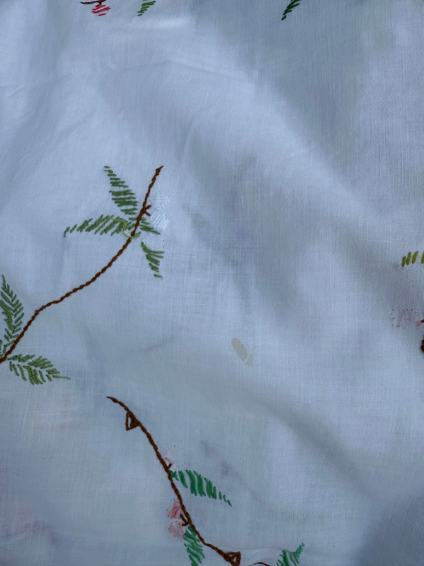 AA. multi colored flowers with yellow blanket stitch 58" x 44"