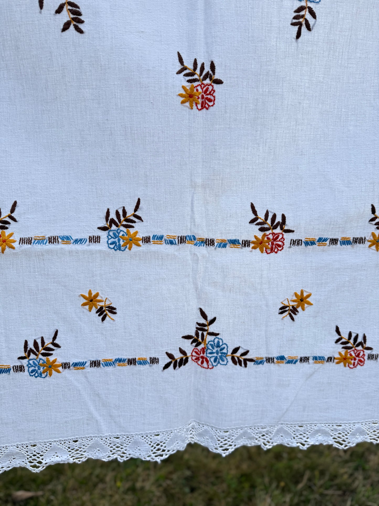 AA. red, blue, orange borders with crochet edging 60" x 51"