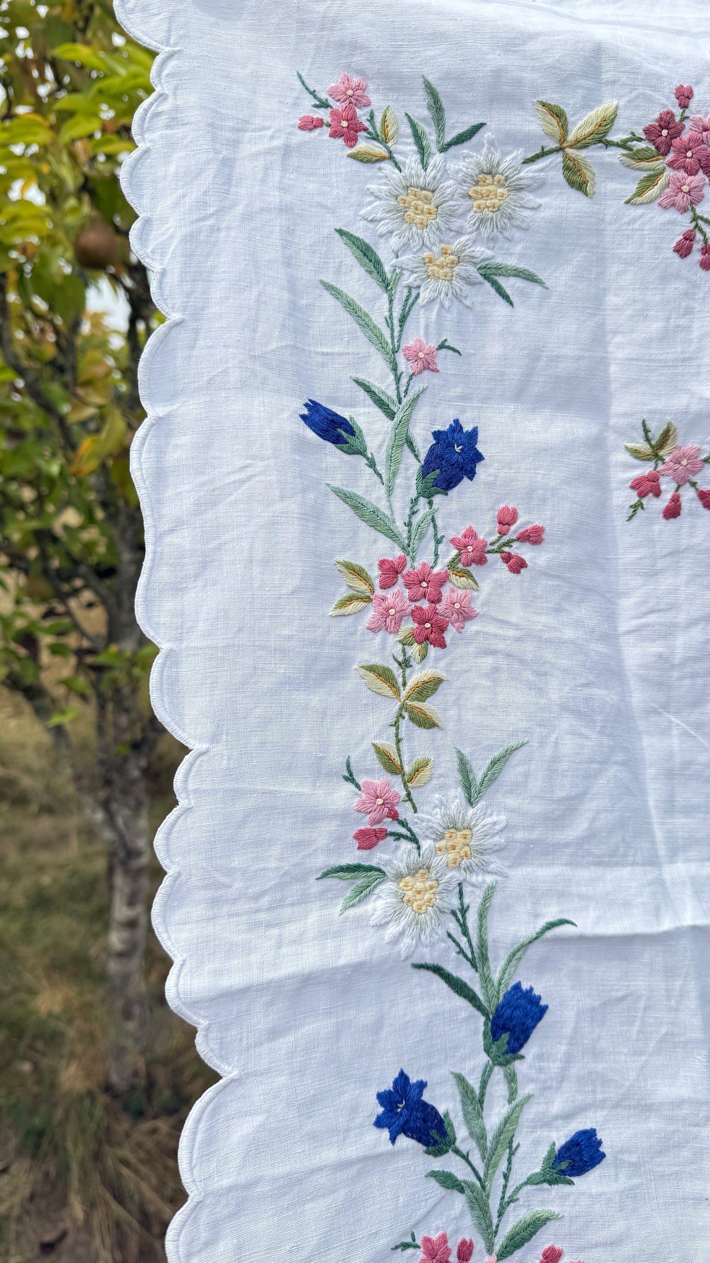 AA. Multi colored embroidered with scallop edges 28" x28"