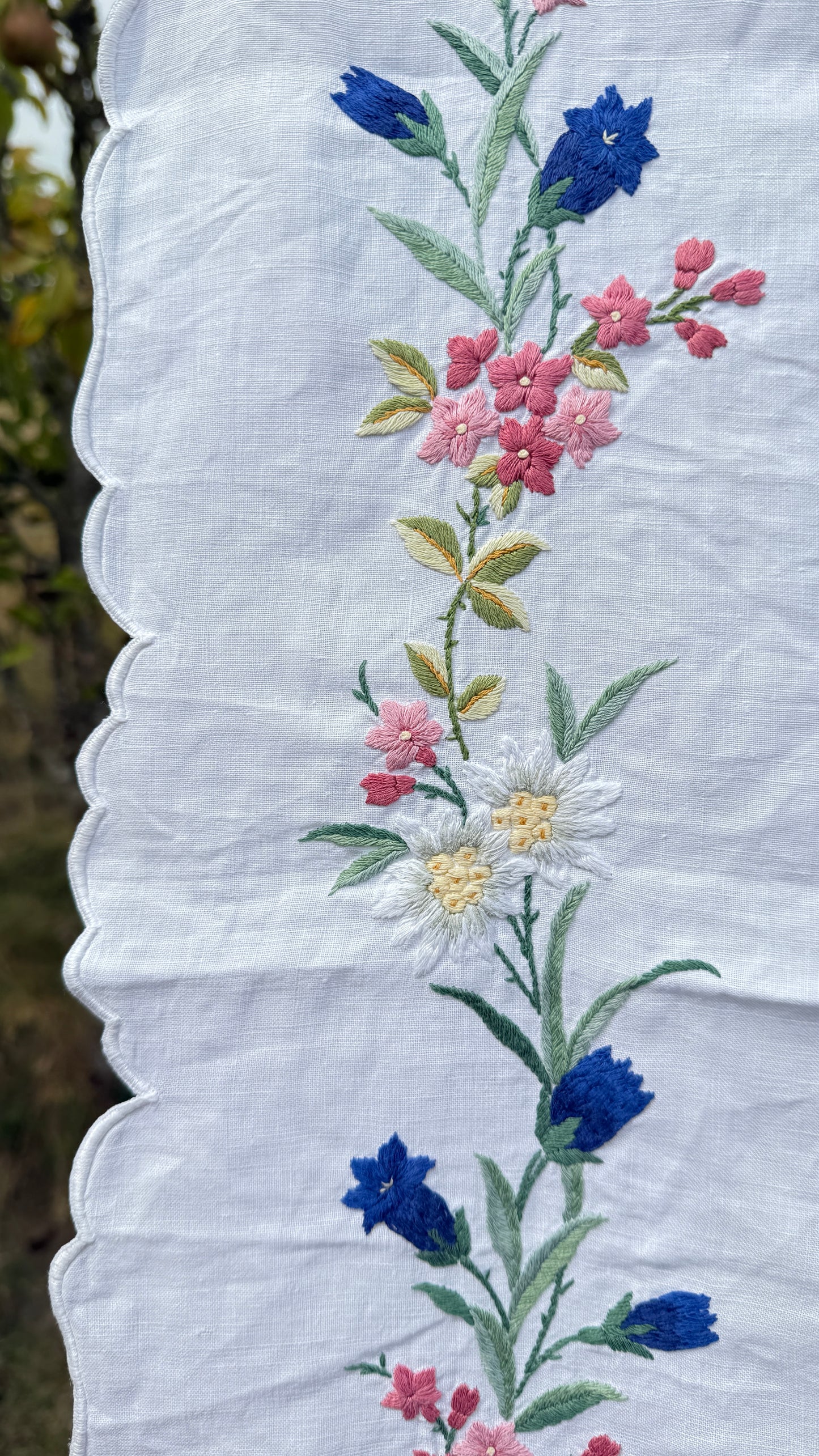 AA. Multi colored embroidered with scallop edges 28" x28"