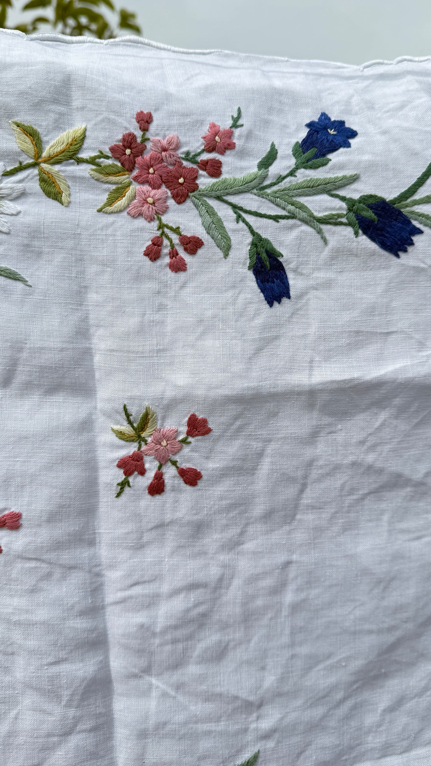 AA. Multi colored embroidered with scallop edges 28" x28"