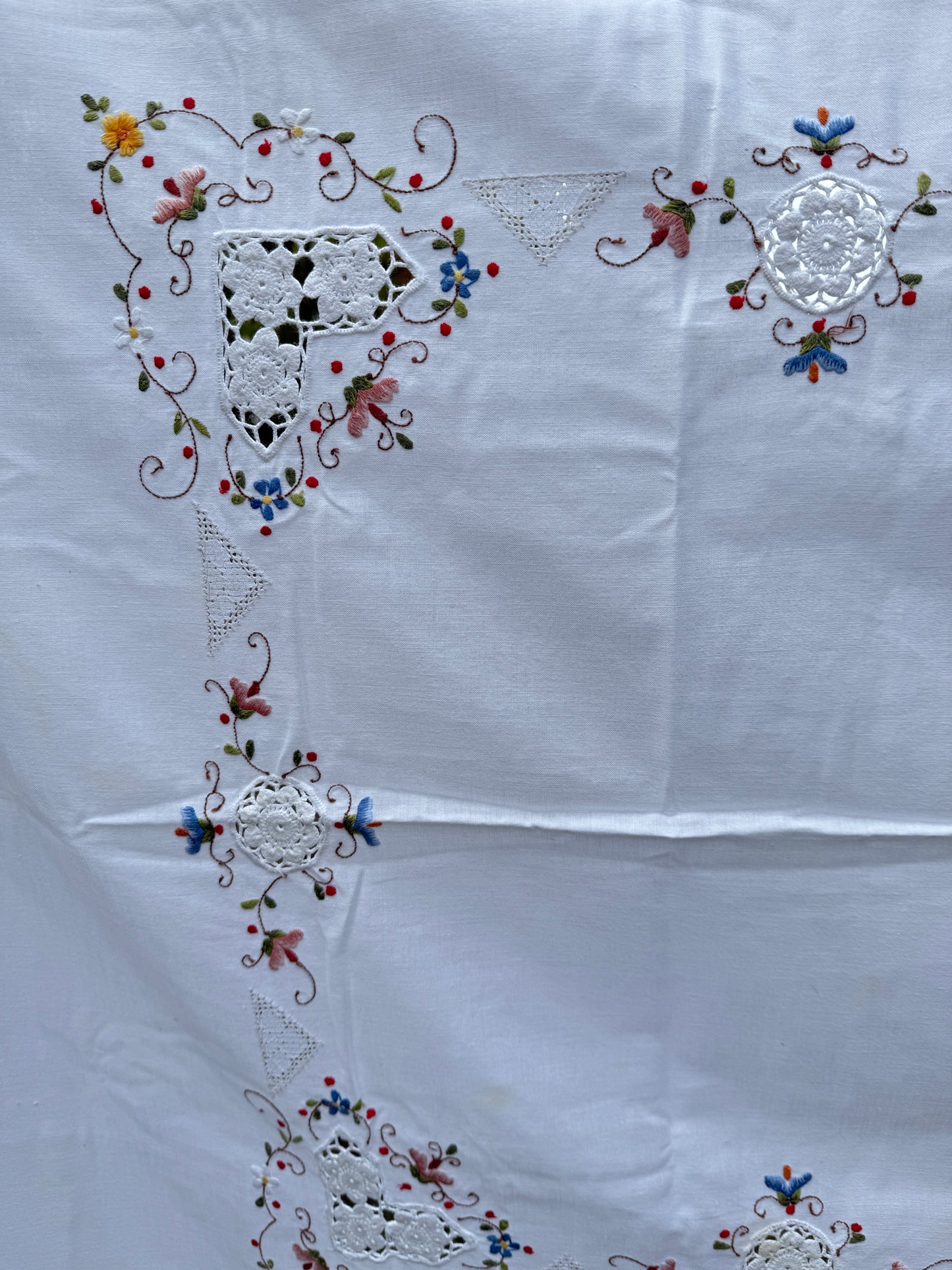 AA. colorful flowers with crochet insets 50" x 66"