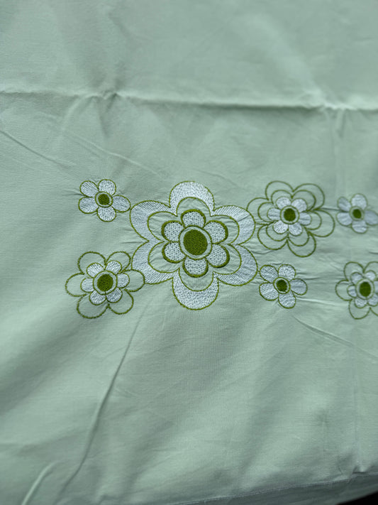 AA. Mint green sheet with daisy machine embroidery 55" x 97"