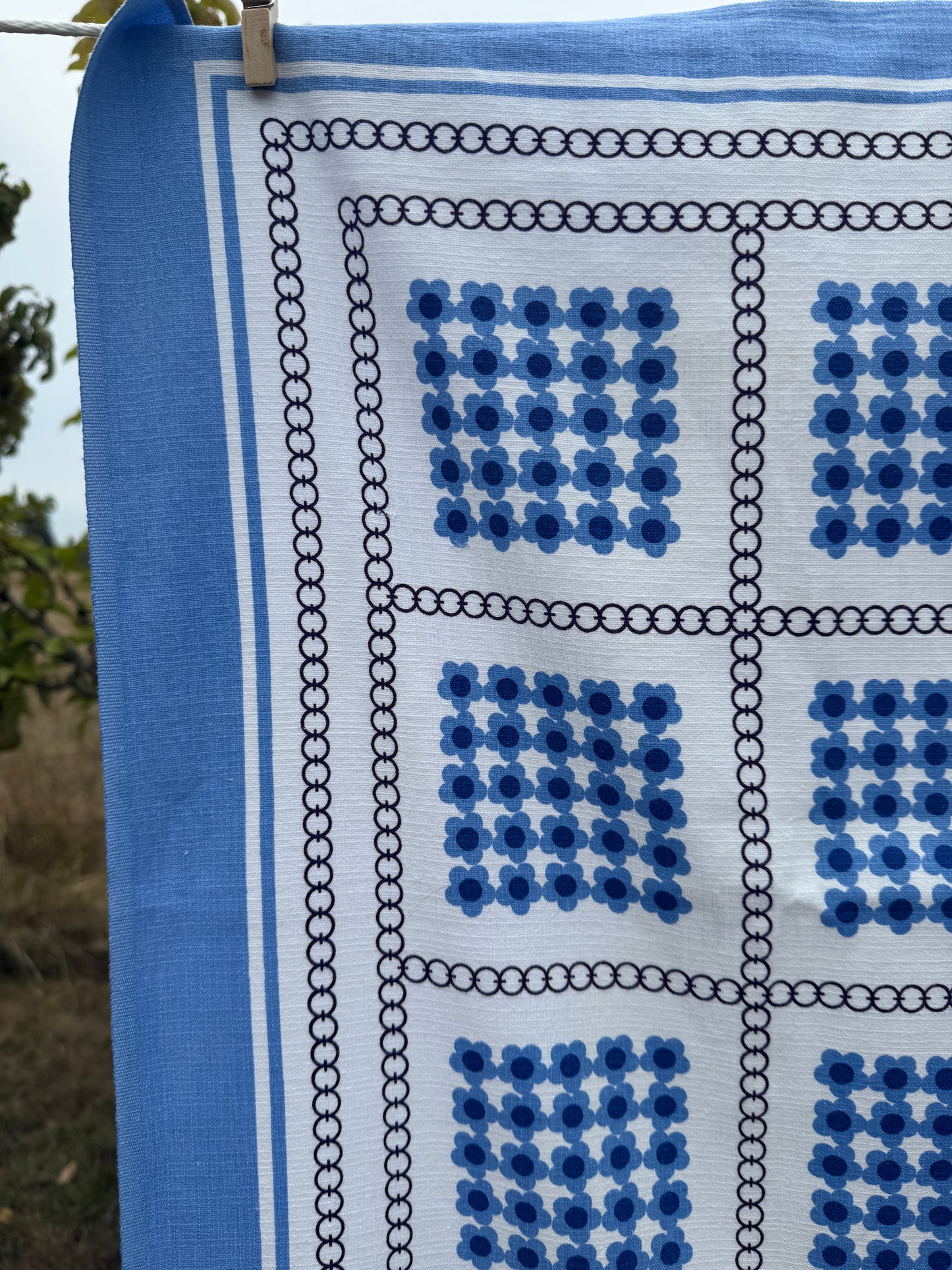 AA. Blues and greens daisy printed 50" x 40"