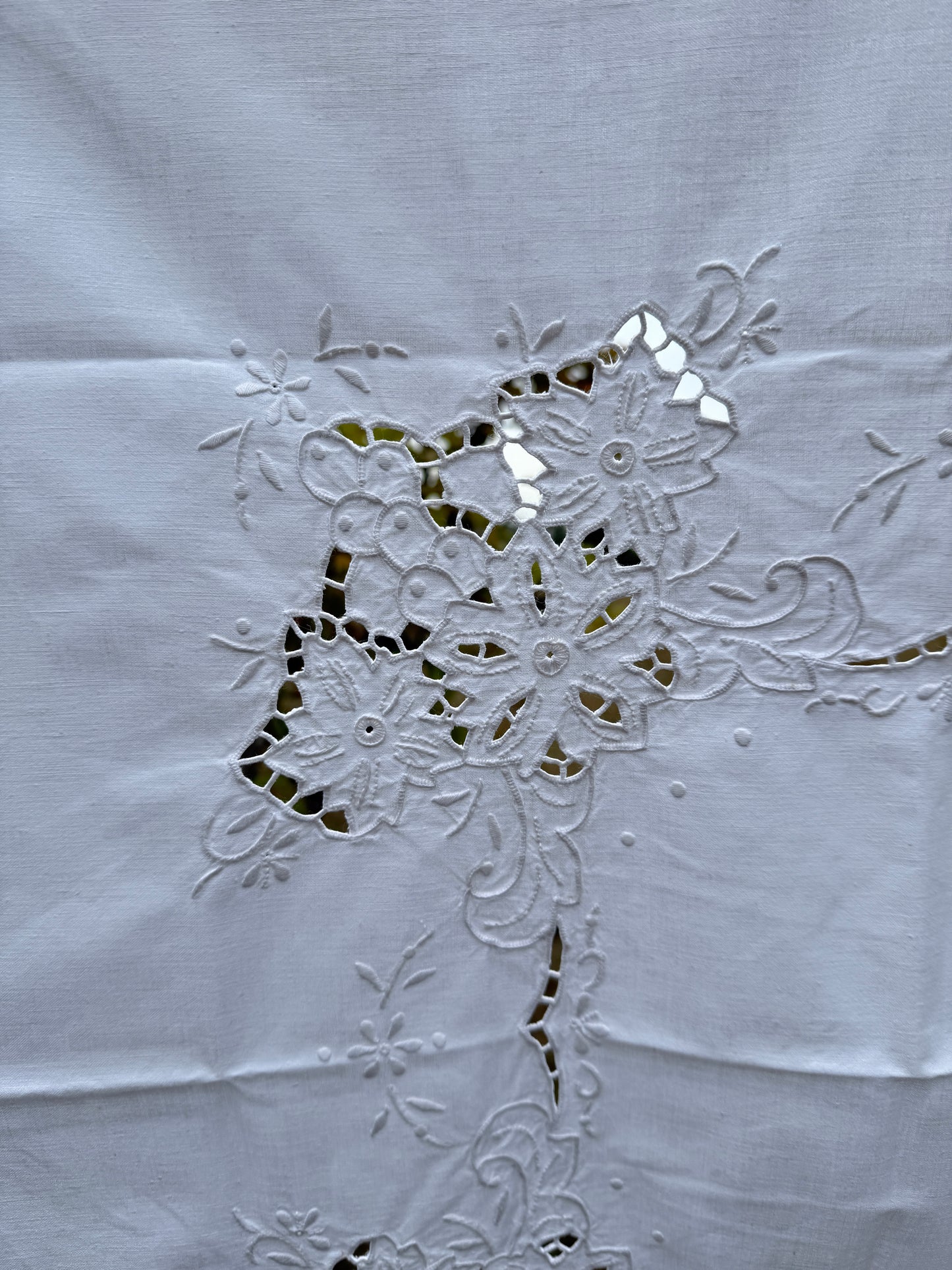 AA. white on white cutwork 32" x 34"