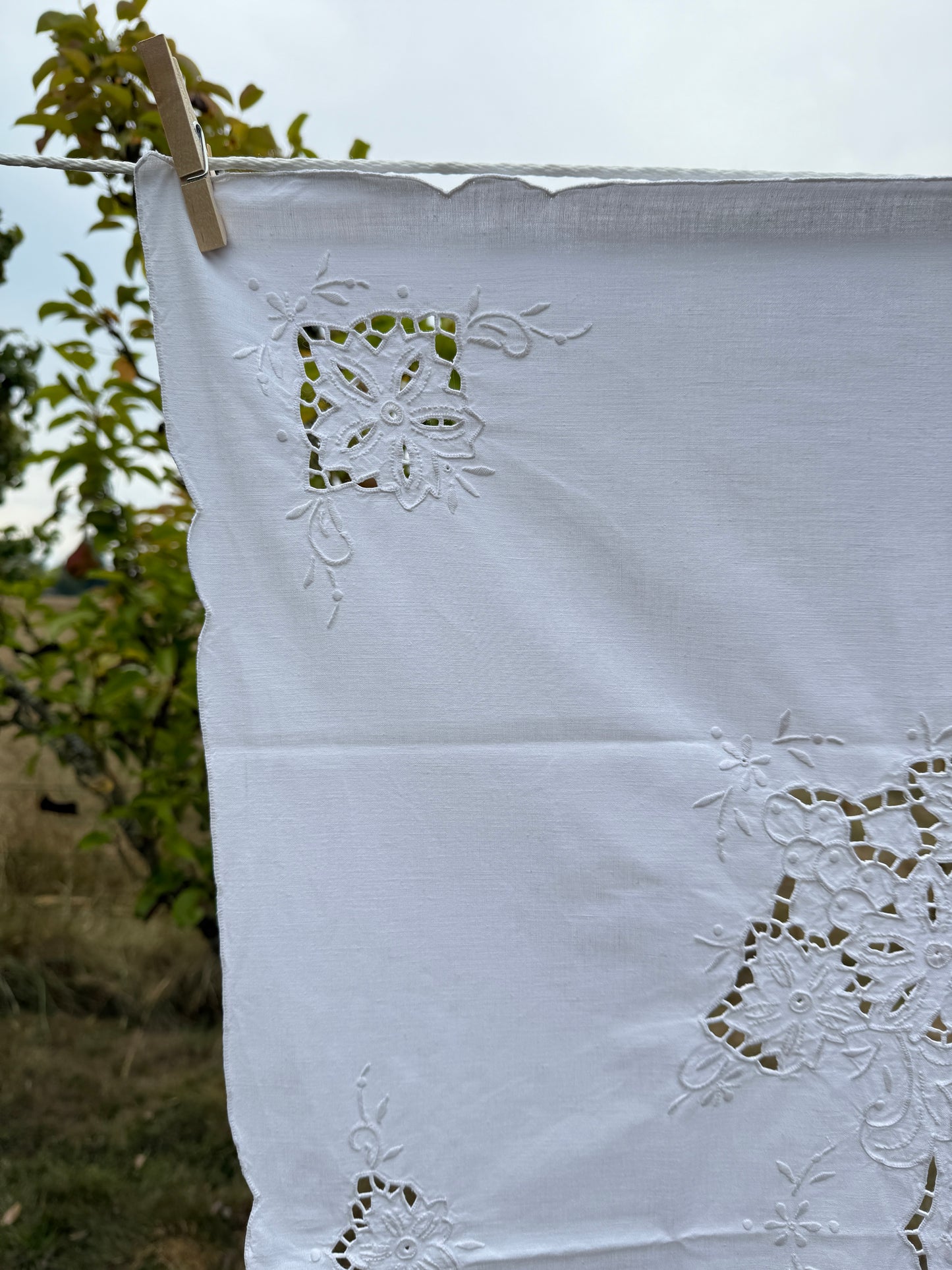 AA. white on white cutwork 32" x 34"