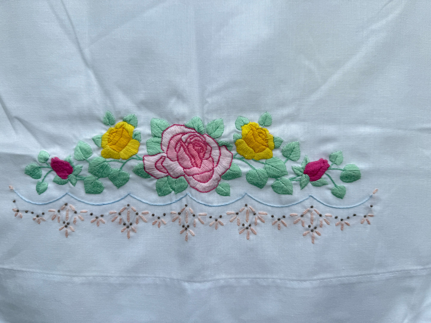 AA. single pillowcase with colorful embroidery