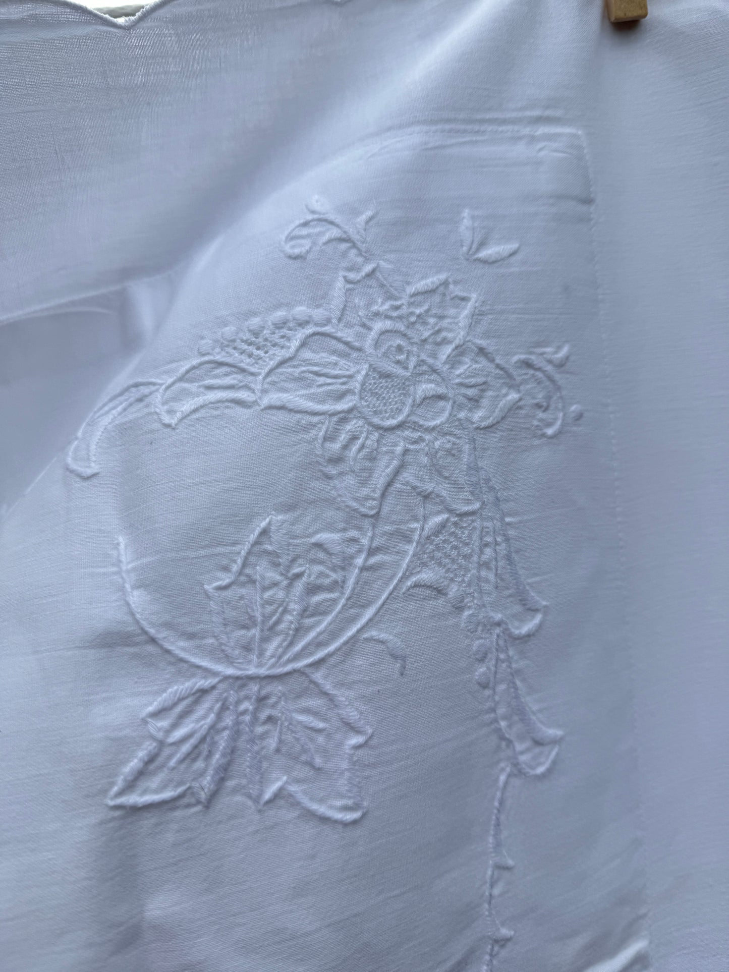 AA. Pair of pillow shams with white embroidery