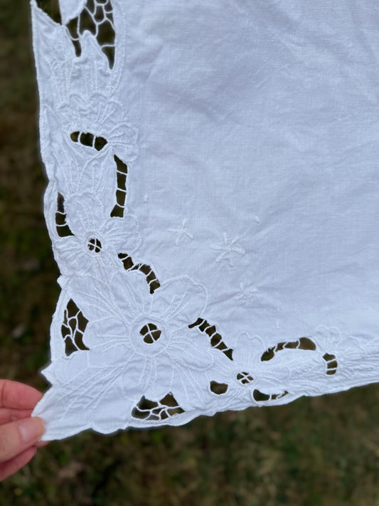 AA.White on white cut work 50" x 70"