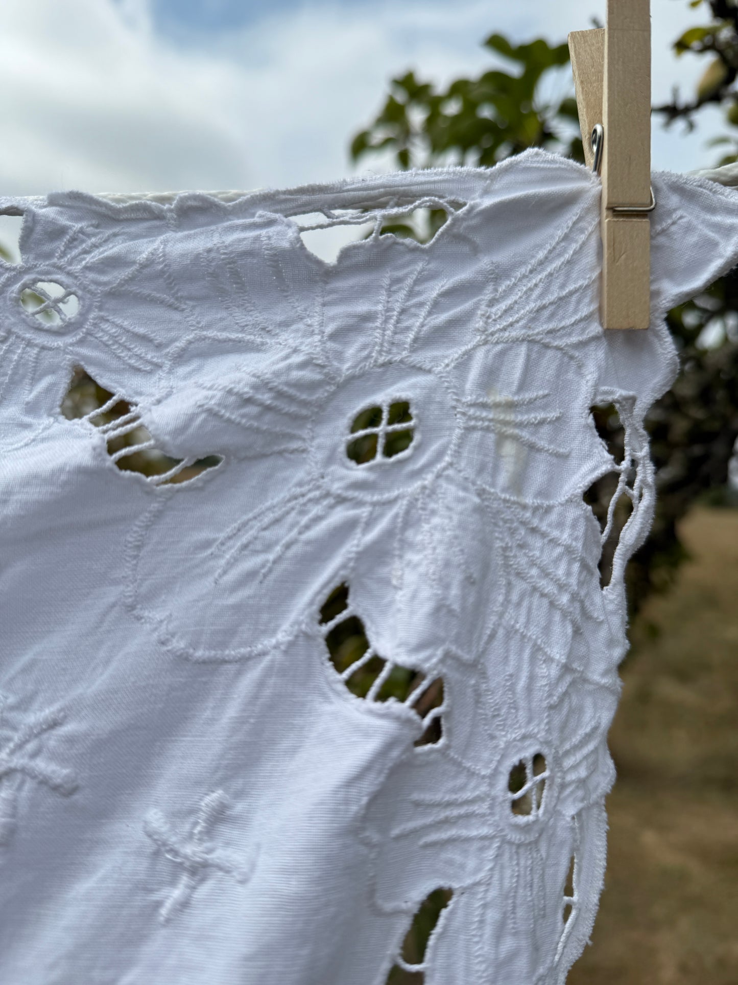 AA.White on white cut work 50" x 70"