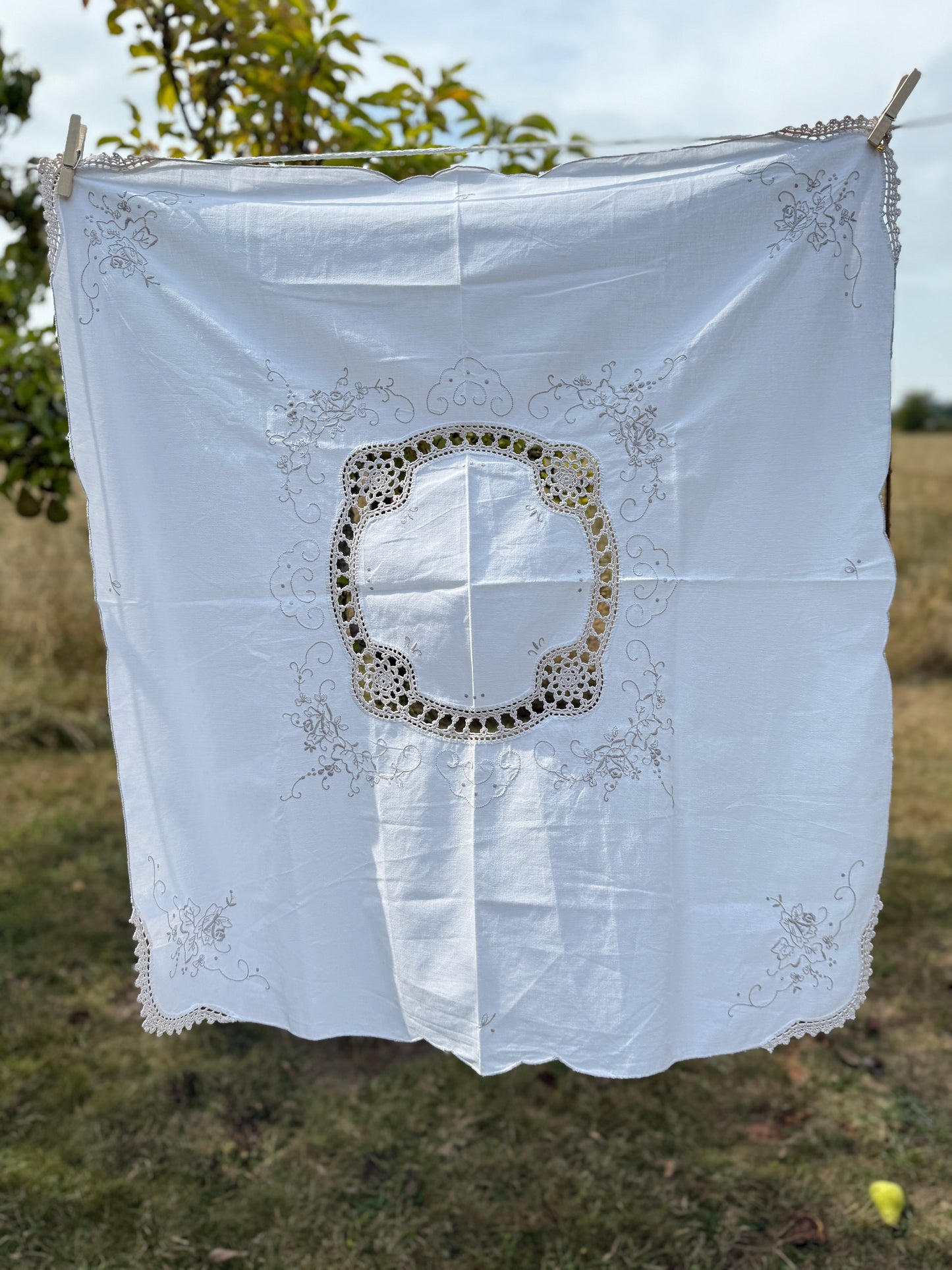 AA.off white with tan crochet inserts and trim 31" x 32"