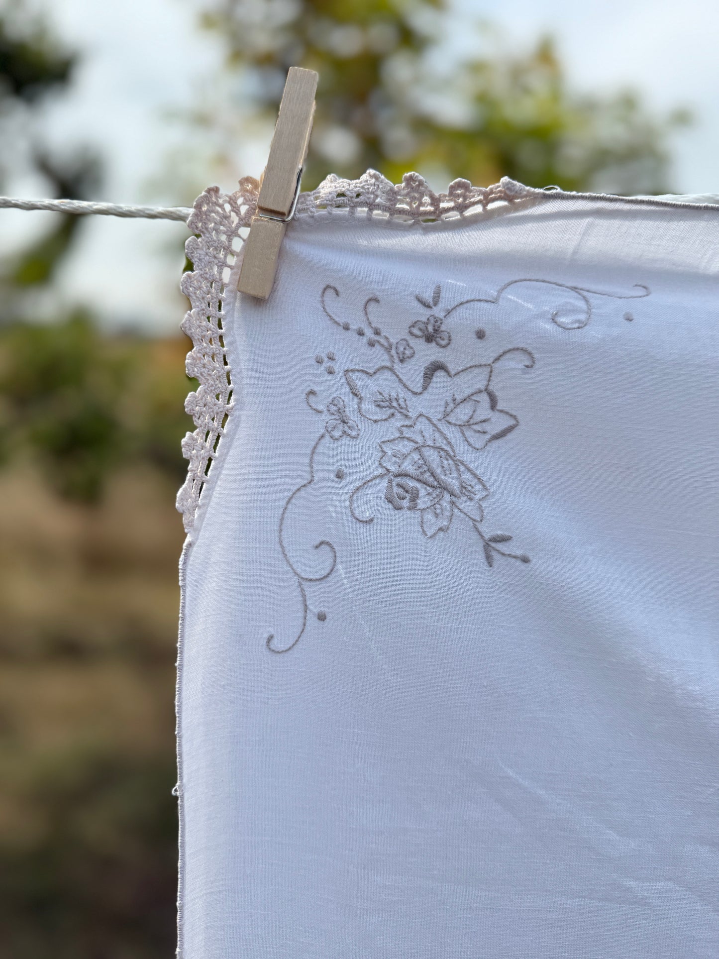 AA.off white with tan crochet inserts and trim 31" x 32"