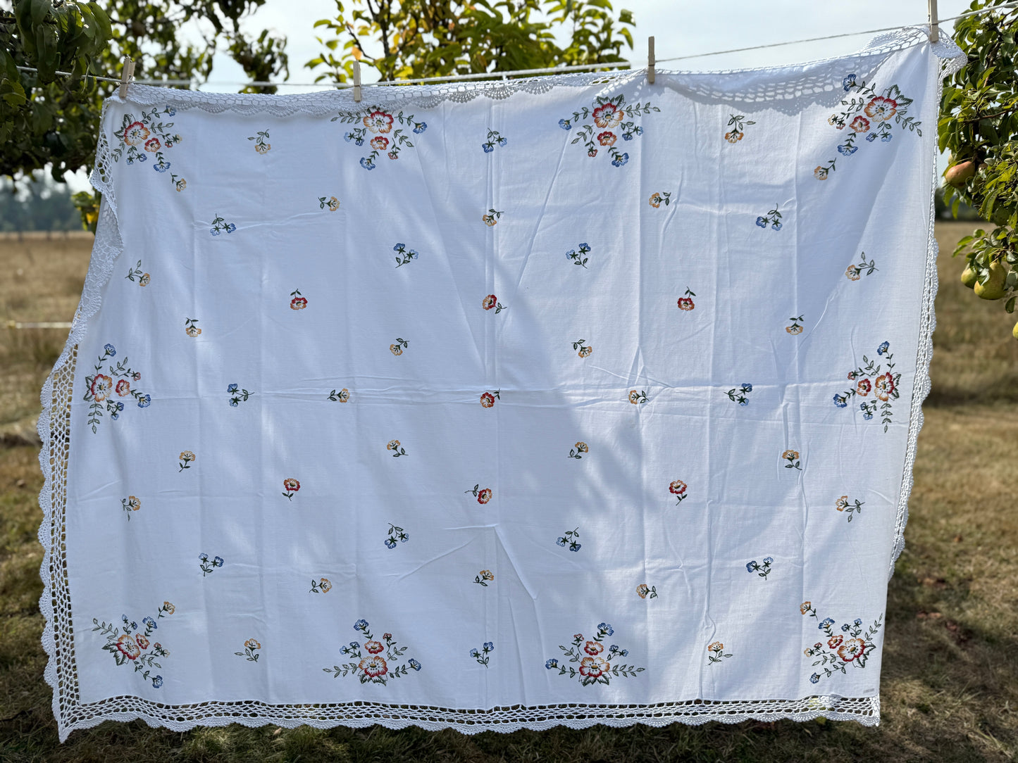 AA. flower bouquets with crochet trim 60" x 46"