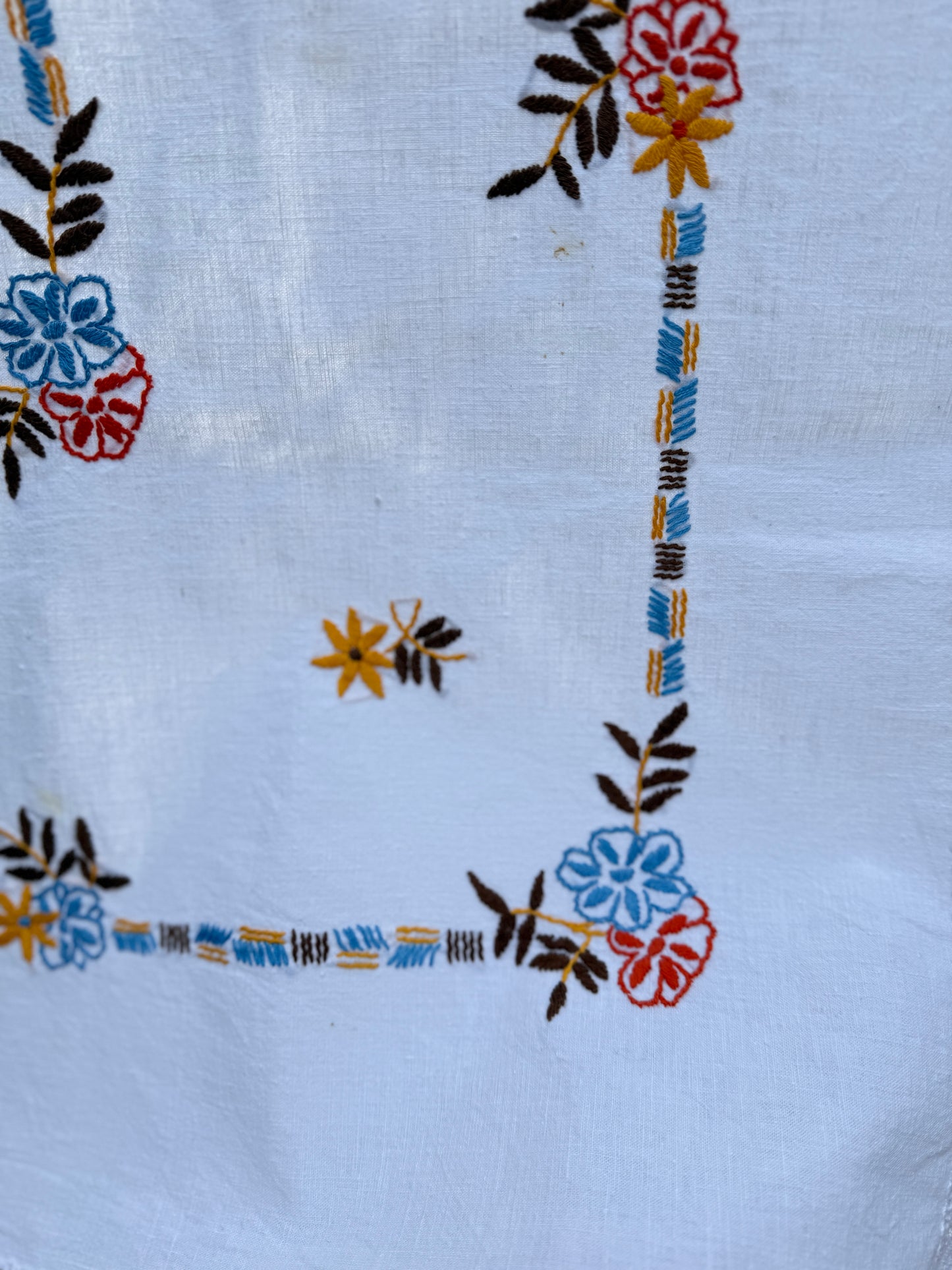 AA. red, blue, orange borders with crochet edging 60" x 51"