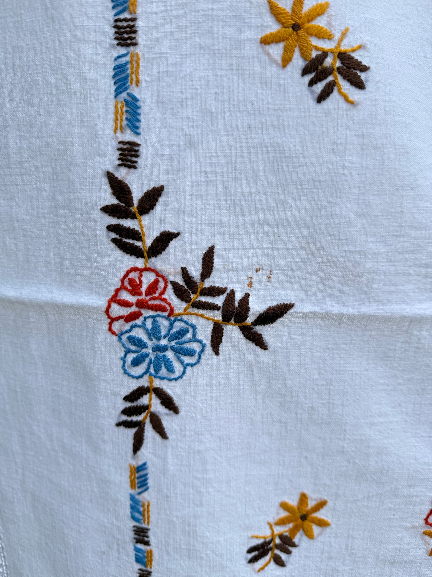 AA. red, blue, orange borders with crochet edging 60" x 51"