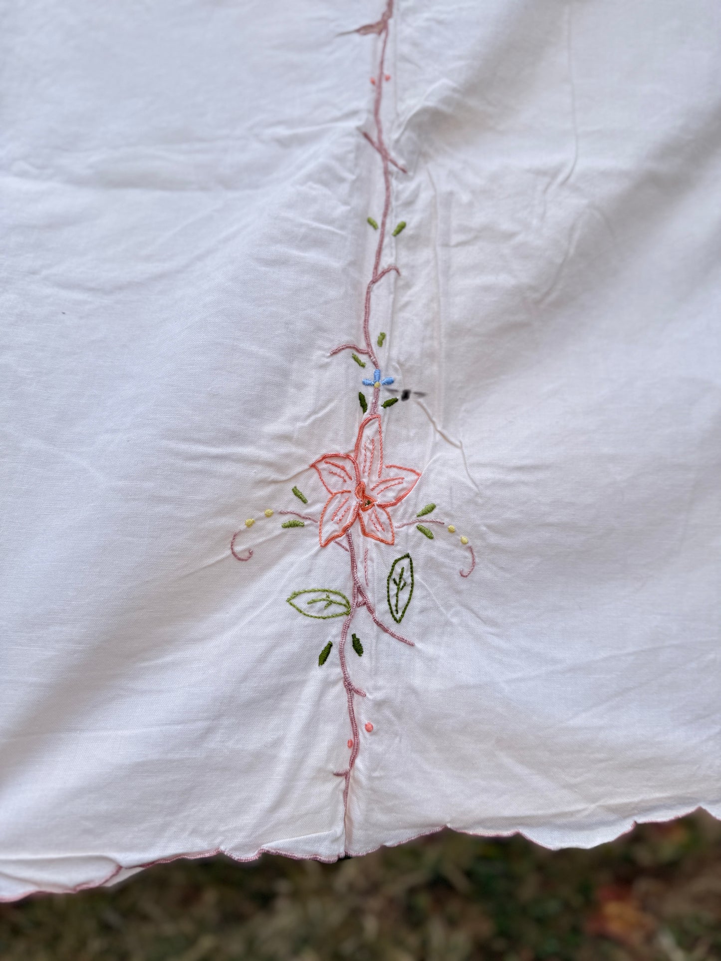 AA. off white multi colored 60" x 100"