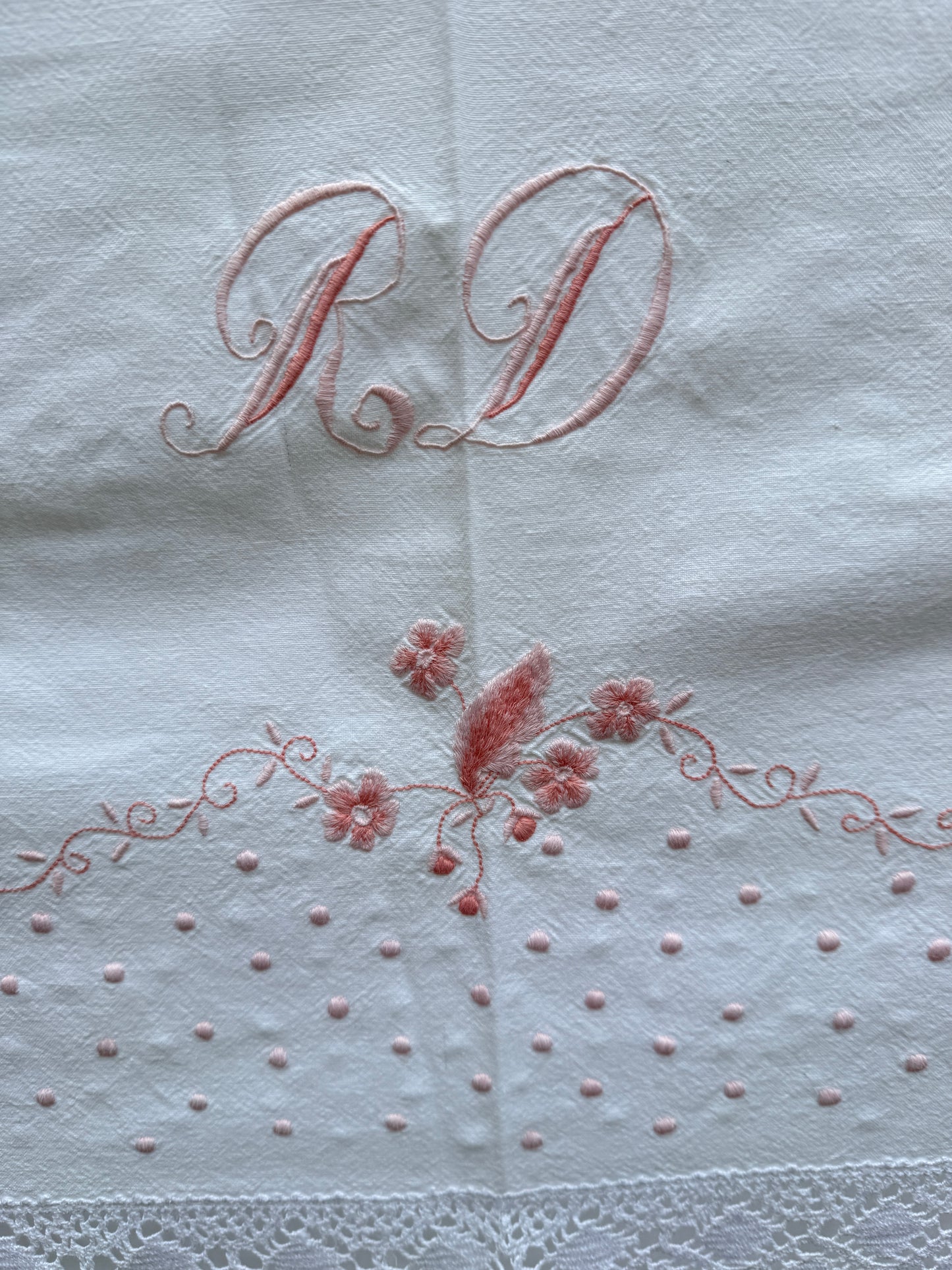 AA. Pink embroidered sheet with crochet trim 63" x 90"