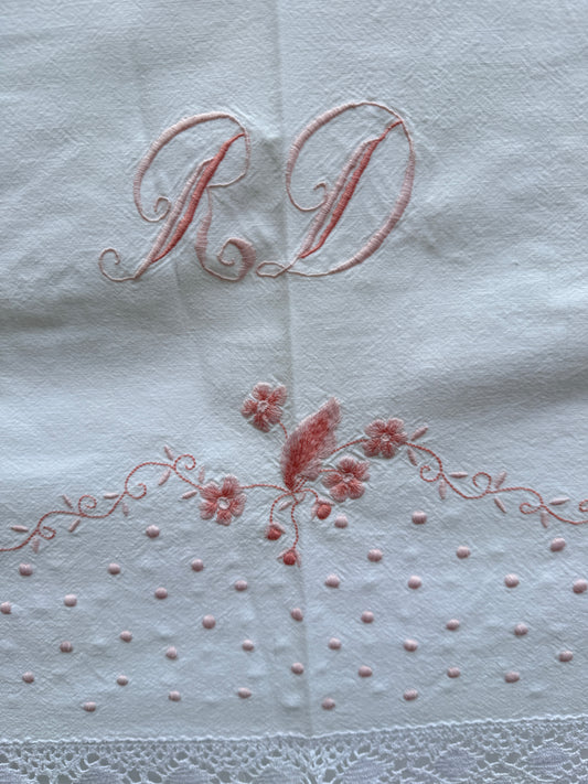 AA. Pink embroidered sheet with crochet trim 63" x 90"
