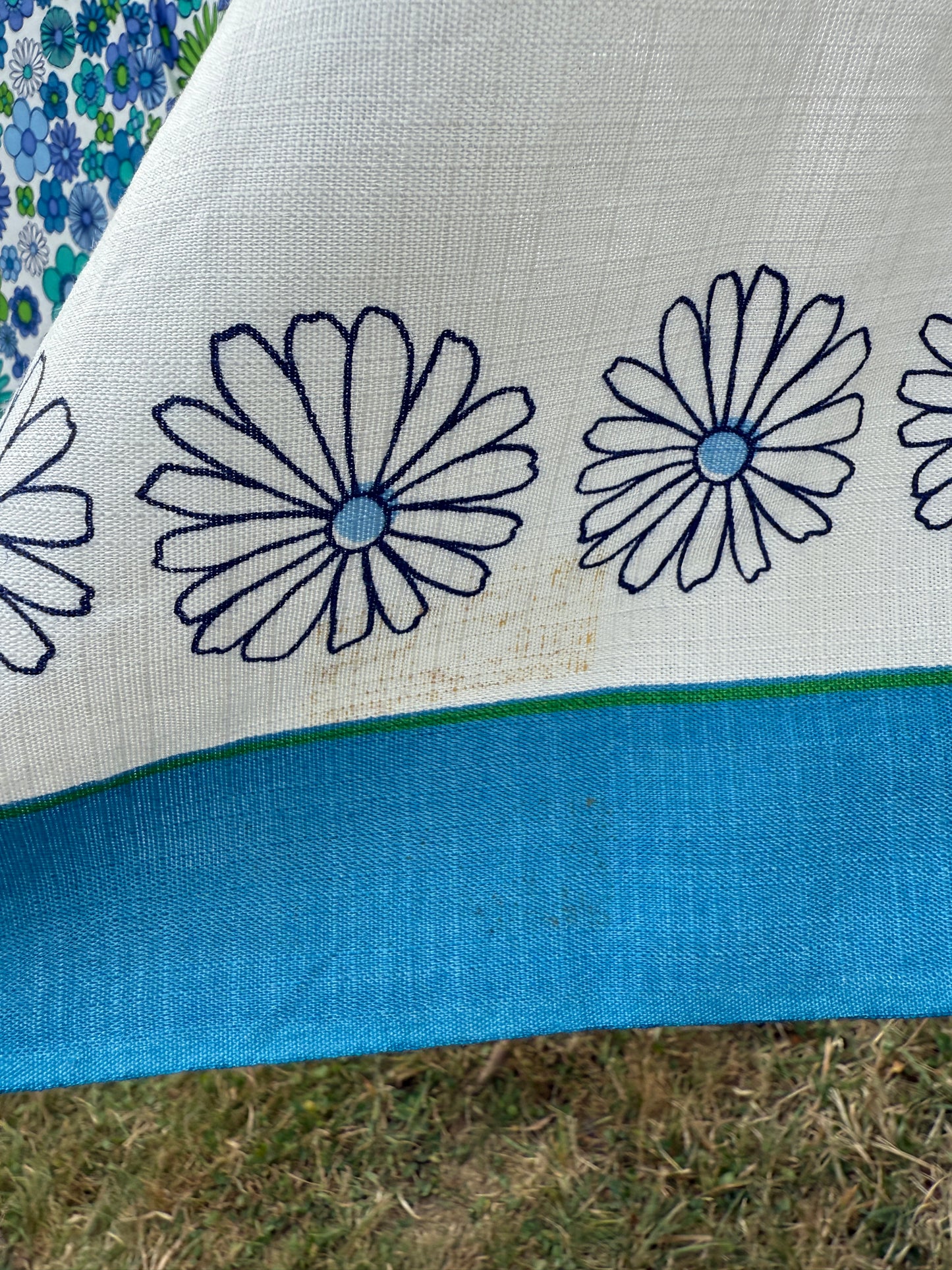 AA. Blues and greens daisy printed 50" x 60"