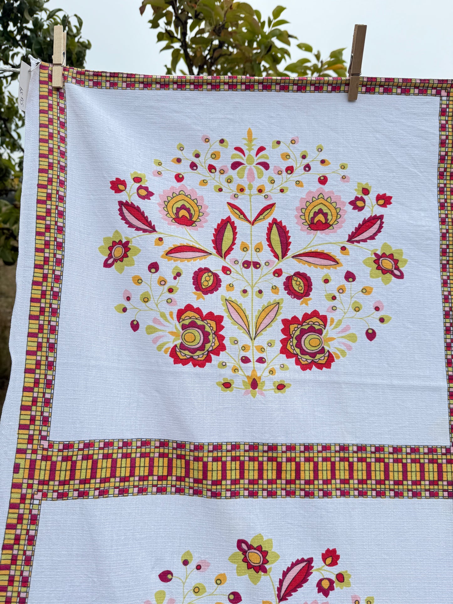 AA. Hot pinks and orange printed 53" x 59"