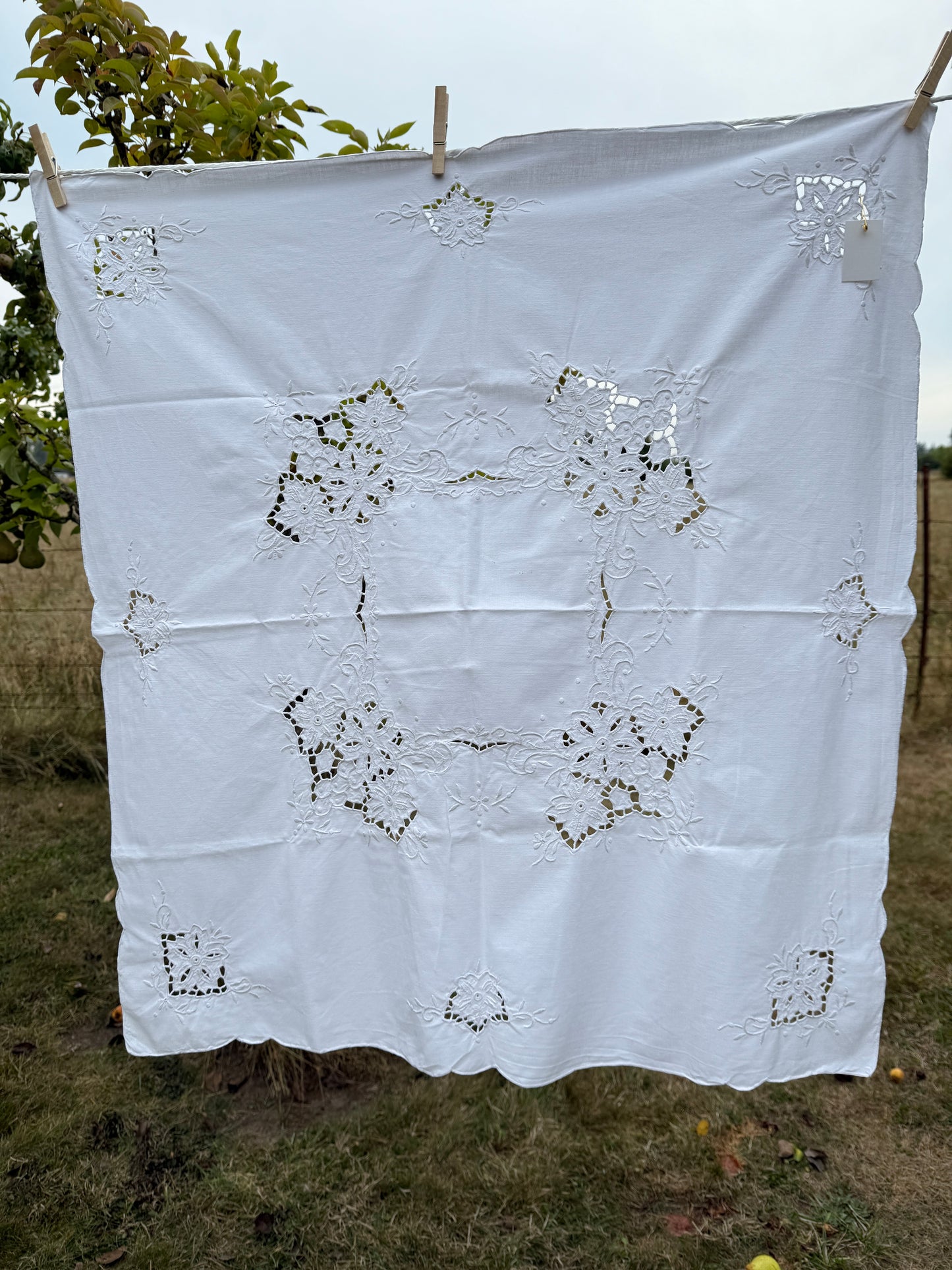 AA. white on white cutwork 32" x 34"